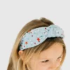 Bandeau « Sweet Wink » orné de pierres précieuses