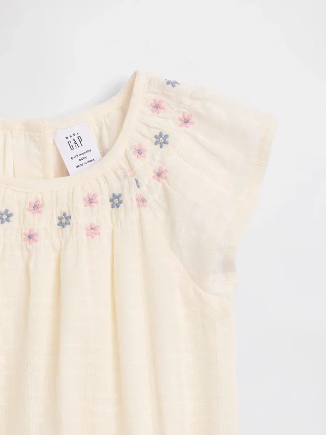 Bodys smockés à fleurs pour bébé