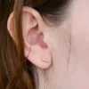 Boucles d’oreilles Admiral Row en or avec perle en forme de barre