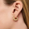 Boucles d’oreilles créoles « Huggie » Mini d’Ana Luisa Wade