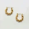 Boucles d’oreilles créoles ovales torsadées en or Admiral Row