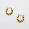 Boucles d’oreilles créoles ovales torsadées en or Admiral Row