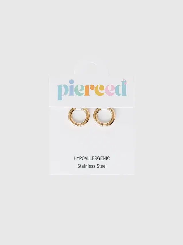 Boucles d’oreilles Huggie dorées 8 mm de Pierced Co