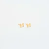 Boucles d’oreilles « Initial » en or Admiral Row