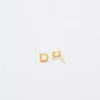 Boucles d’oreilles « Initial » en or Admiral Row