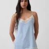 Caraco en mélange de lin avec bordures en dentelle