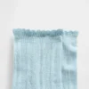 Chaussettes mi-mollet en pointelle