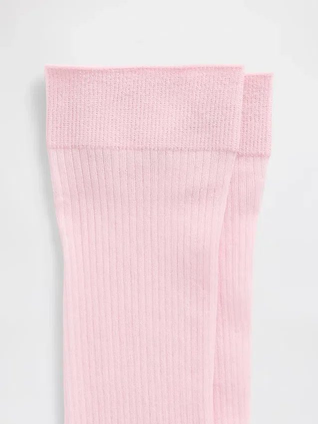 Chaussettes transparentes à côtes montant jusqu'aux genoux