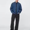 Chemise en denim à poches
