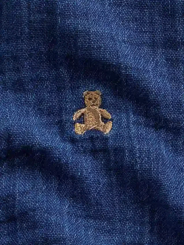 Combinaison courte en denim et gaze de coton pour bébé