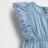 Combinaison en denim à œillets pour bébé