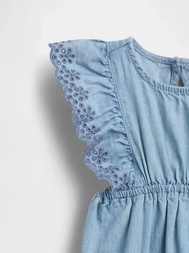 Combinaison en denim à œillets pour bébé