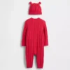 Combinaison en tricot torsadé pour bébé