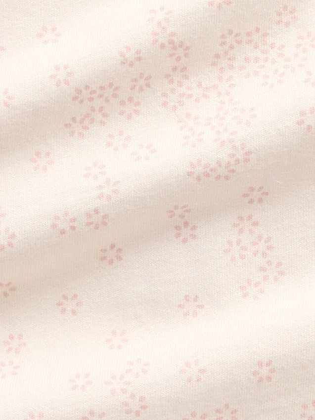 Combinaison à pieds pour bébé en coton bio à motif floral