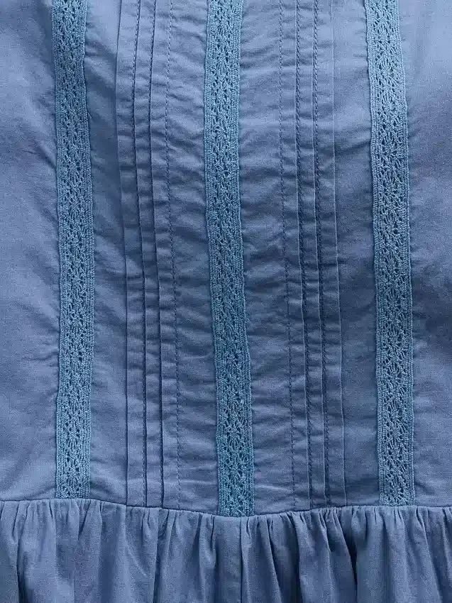Combinaison pour enfant à bordures en dentelle