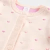 Ensemble pull et salopette pour bébé