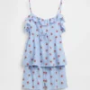 Ensemble pyjama pour enfant en tissu recyclé avec caraco à volants et shorts