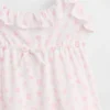 Ensemble pyjama pour enfant en tissu recyclé avec caraco à volants et shorts