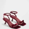 Escarpins à talons bobines, bout ouvert et lanières avec nœud en velours