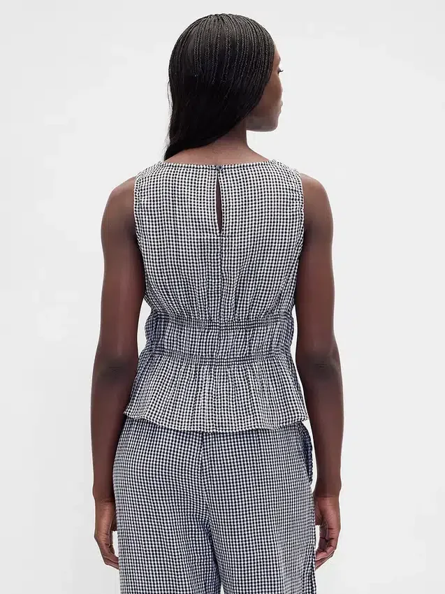 Haut à basque en gaze de coton smockée à la taille