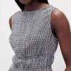 Haut à basque en gaze de coton smockée à la taille