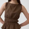 Haut à basque en gaze de coton smockée à la taille