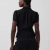 Haut à basque transparent boutonné sur le devant