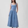 Jupe longue à œillets à taille haute