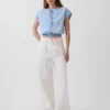 Haut court en denim à manches courtes et boutons sur le devant