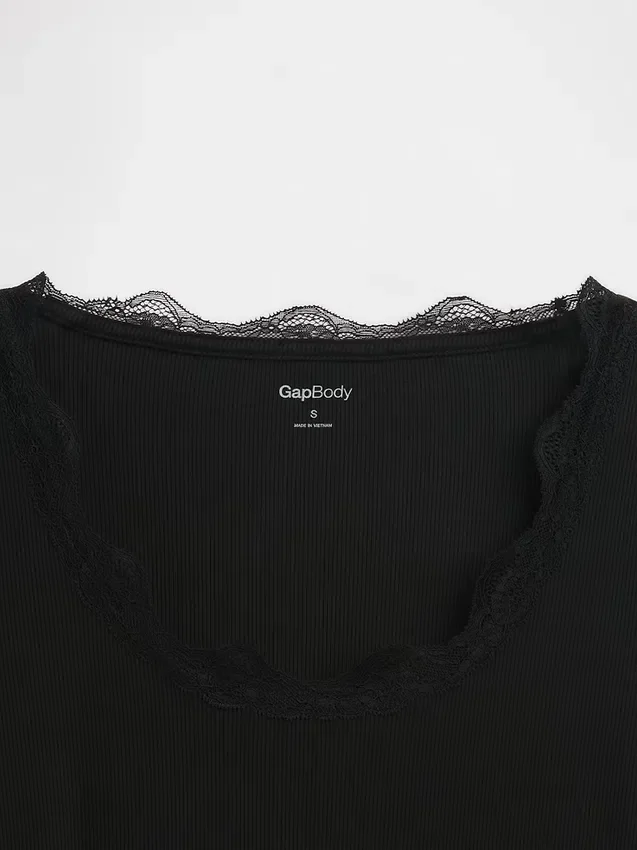 Haut de pyjama à fines côtes et bordure en dentelle