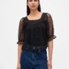 Haut en tulle transparent brodé