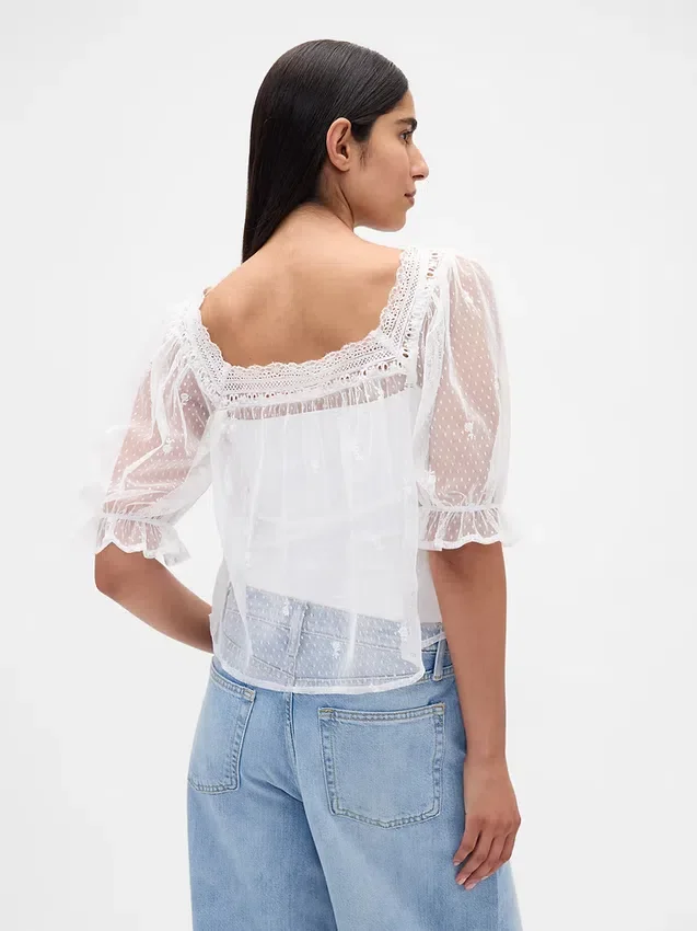 Haut en tulle transparent brodé