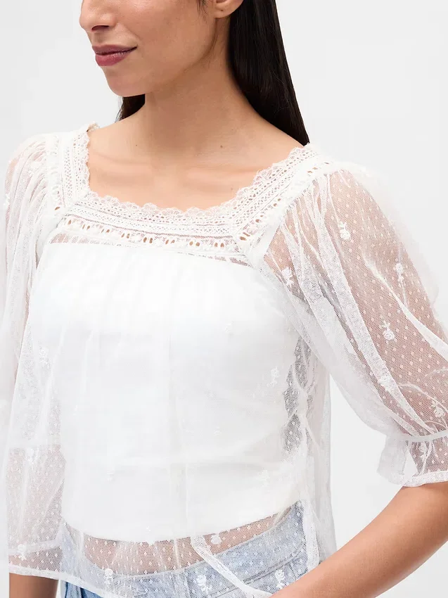 Haut en tulle transparent brodé