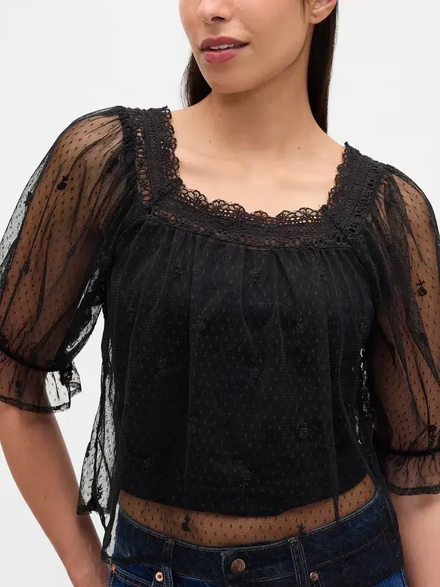 Haut en tulle transparent brodé