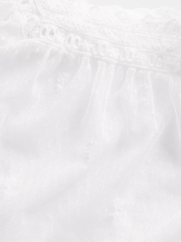 Haut en tulle transparent brodé