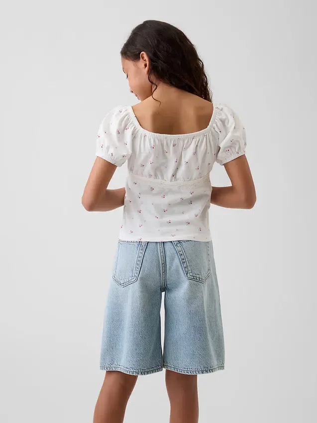Haut à manches bouffantes et bordures en dentelle pour enfants