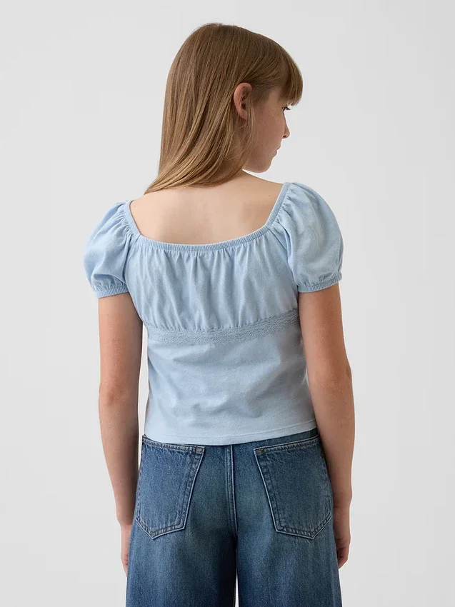 Haut à manches bouffantes et bordures en dentelle pour enfants