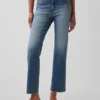 Jean court taille basse, long et ajusté
