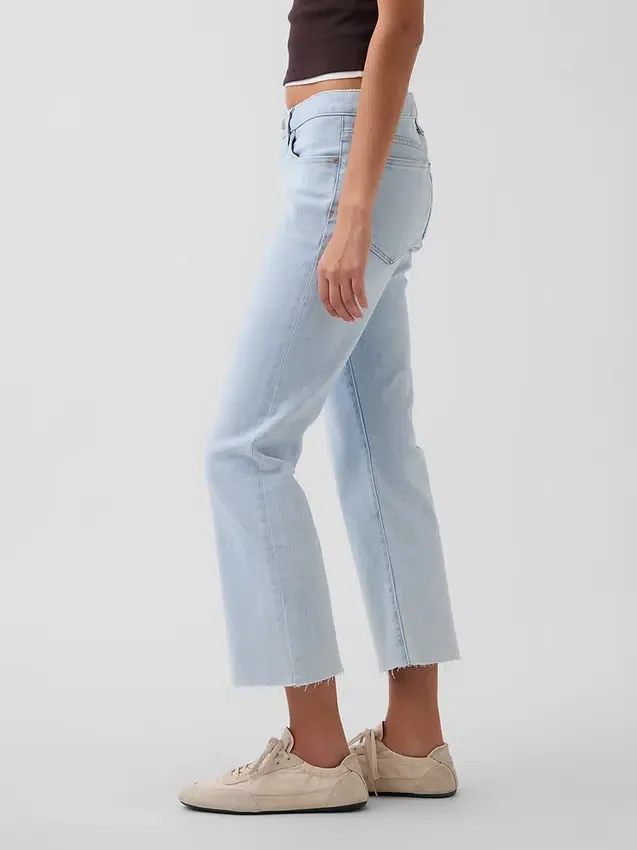 Jean court taille basse, long et ajusté