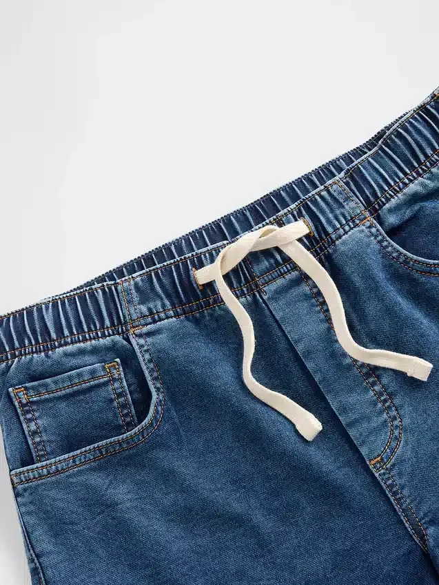Jeans baggy en denim tricoté à taille mi-haute