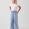 Jeans baggy taille basse à bordure en dentelle pour enfant