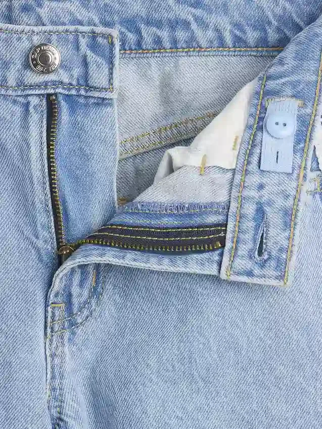 Jeans baggy taille basse à bordure en dentelle pour enfant
