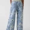 Jeans baggy à taille basse et imprimé floral pour enfants