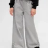Jeans baggy taille basse pour enfant avec nœuds et ourlet fendu