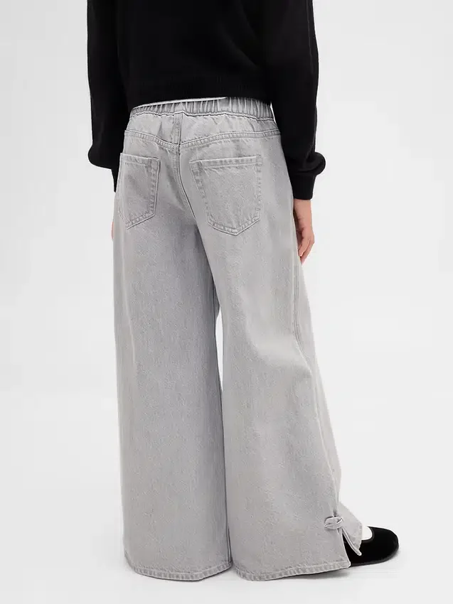 Jeans baggy taille basse pour enfant avec nœuds et ourlet fendu