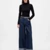 Jeans baggy à taille mi-haute et revers métallisés