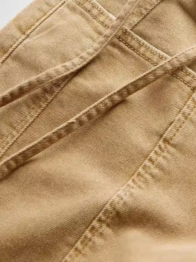 Jeans de taille basse avec micro-ceinture des années 90