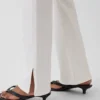 Jeans droit décontracté à taille mi-haute et ourlet fendu