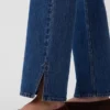 Jeans droit décontracté à taille mi-haute et ourlet fendu