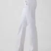 Jeans marin taille basse, long et ajusté